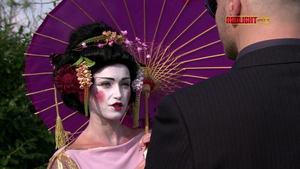 Tina Gabriel in sexy stockings amongst Thomas Stone