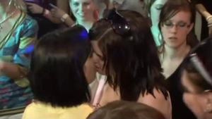 Girl raw kissing each other at the party