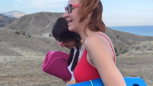 Young schoolgirl receiving facial at the party