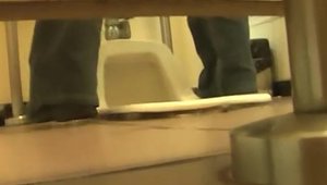 Hairy amateur voyeur pissing in public